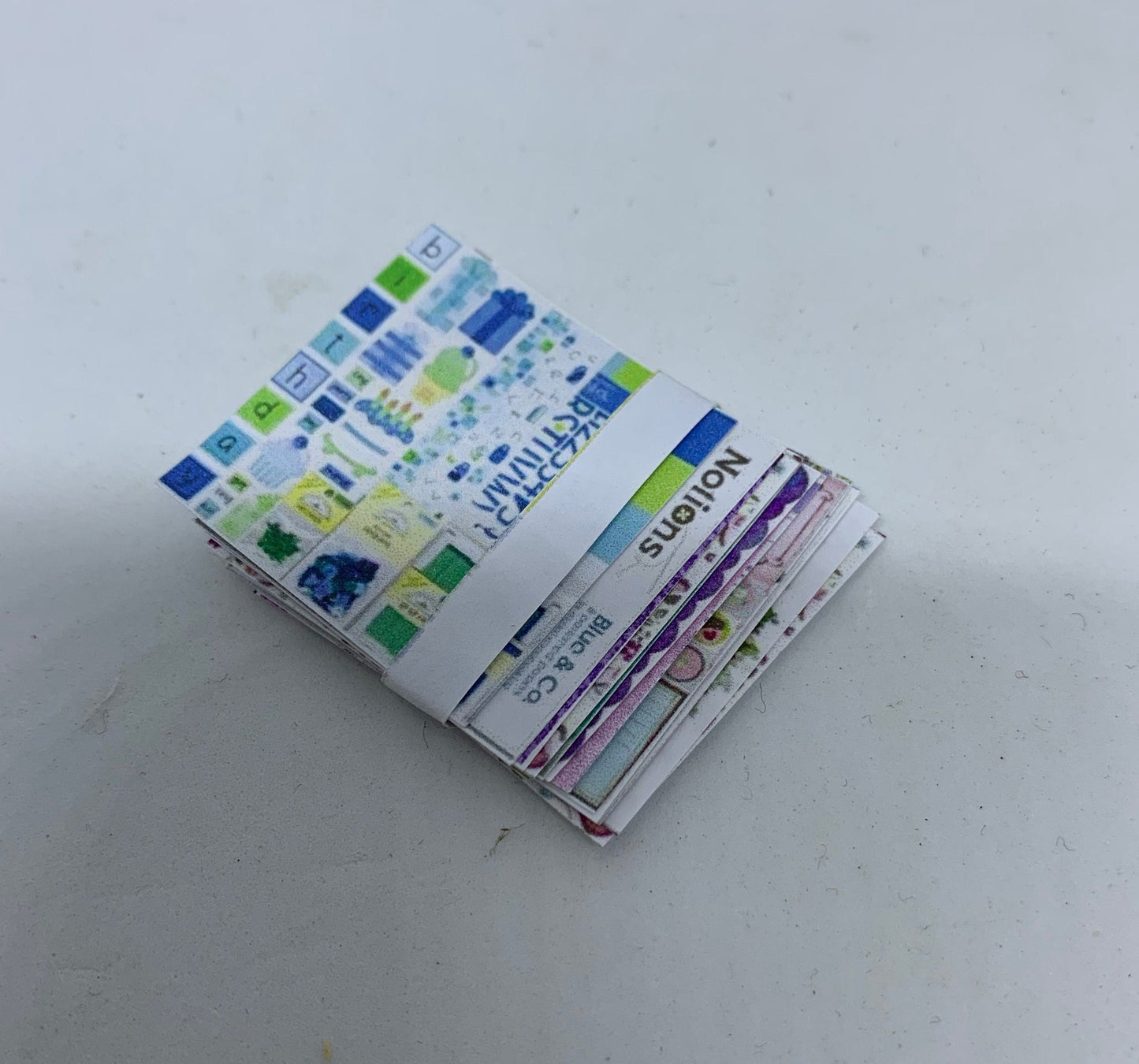 Dolls House Miniatures - Pack of assorted scrapbook papers