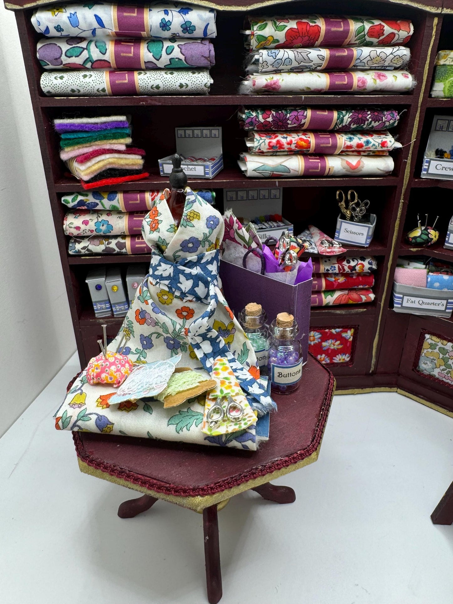 Dolls House Miniatures - 1/12th Liberty fabric and Inspired Haberdashery Shop Shelves and display Table