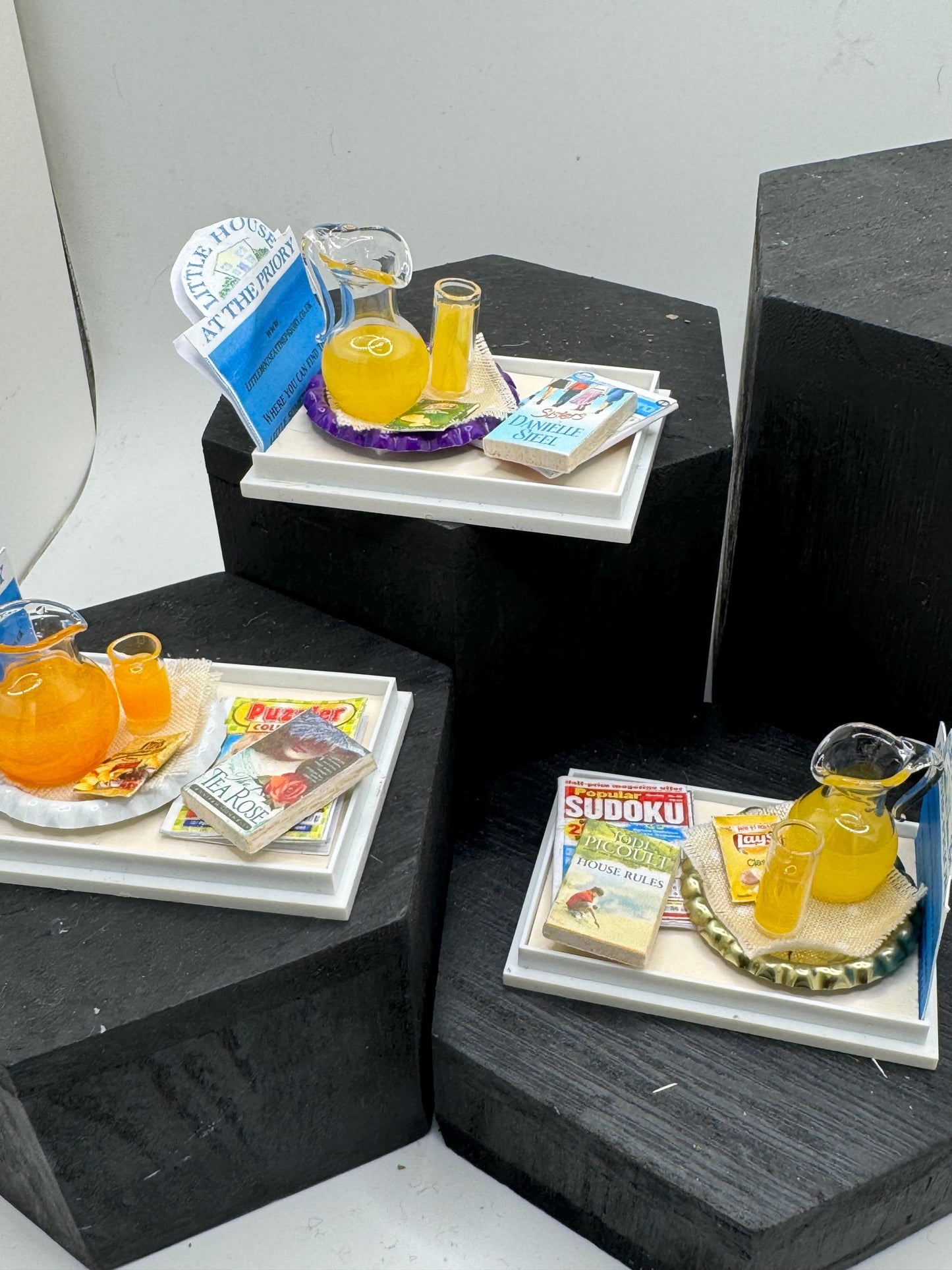 Dolls House Miniatures - 1/12th Orange juice tray with books x 1 (various)