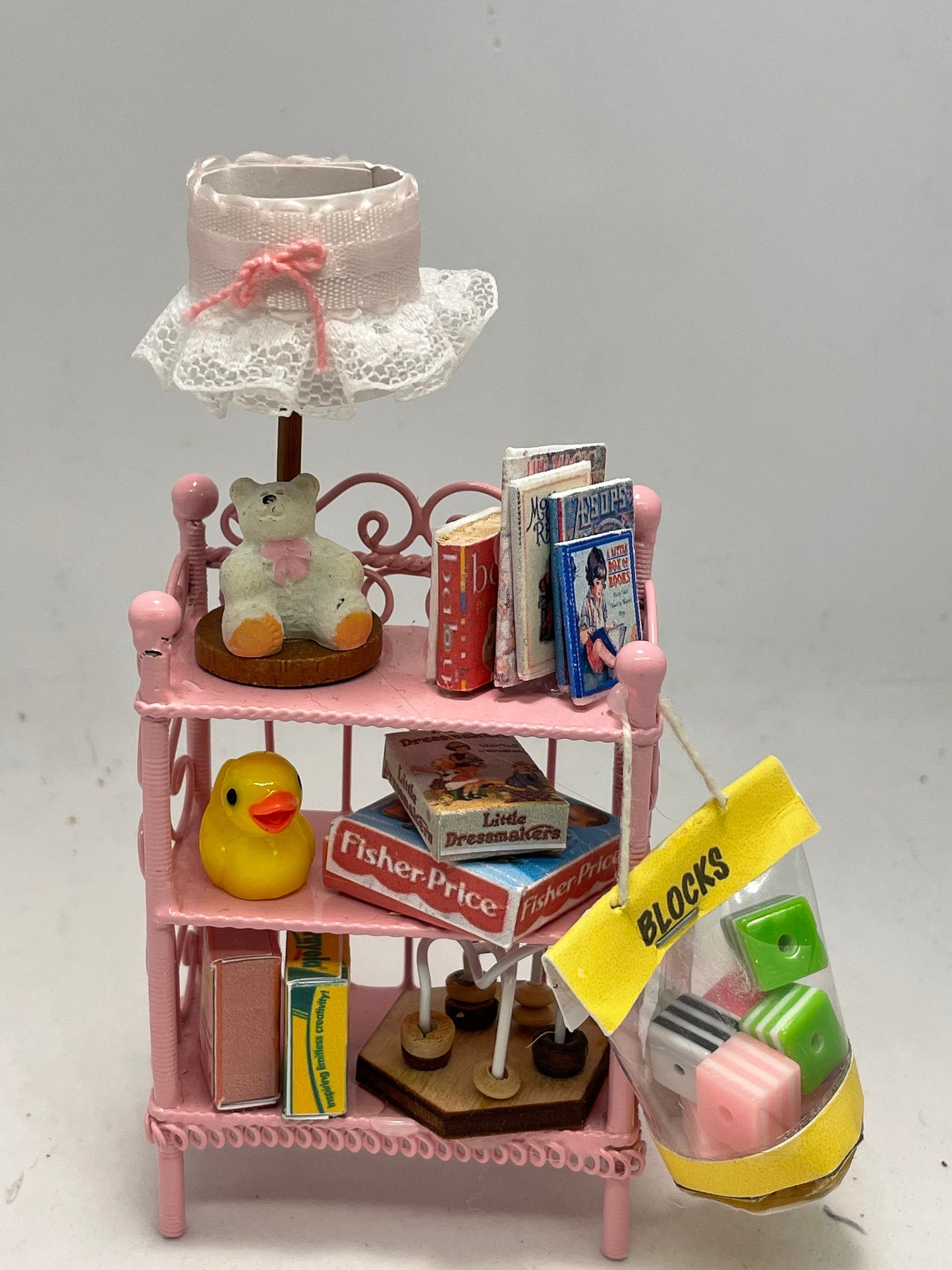 Dolls House Miniatures - Pink wire Girls shelf unit