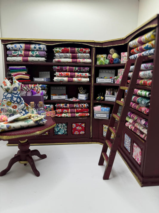 Dolls House Miniatures - 1/12th  Liberty fabric and Inspired Haberdashery Shop Shelves and display Table