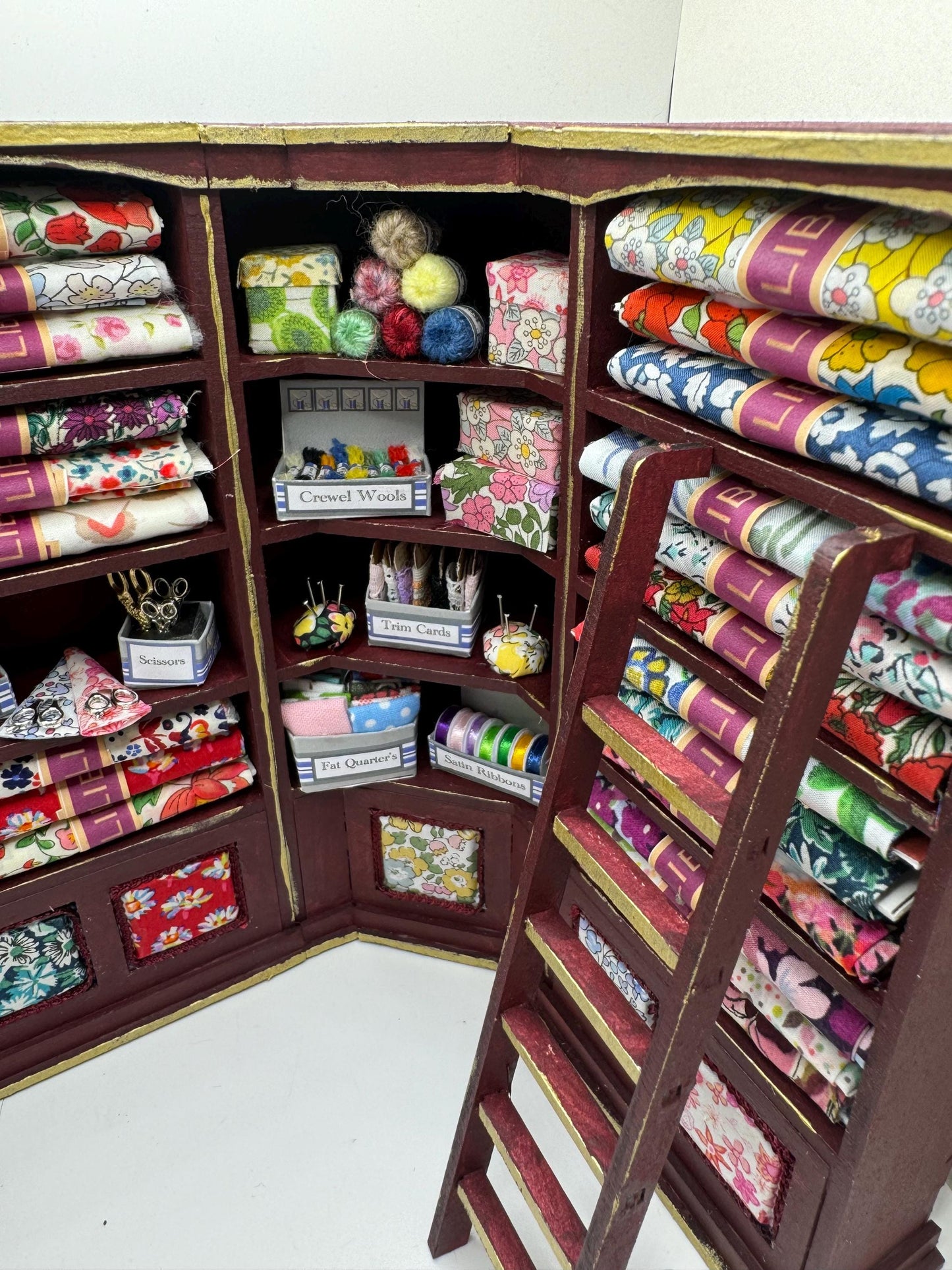 Dolls House Miniatures - 1/12th  Liberty fabric and Inspired Haberdashery Shop Shelves and display Table