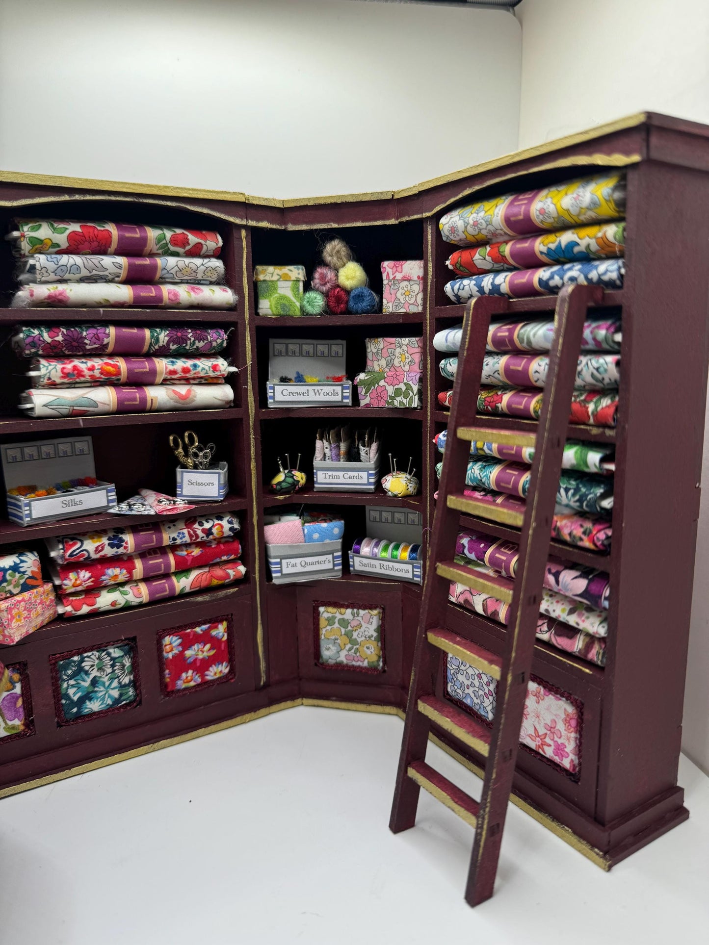 Dolls House Miniatures - 1/12th  Liberty fabric and Inspired Haberdashery Shop Shelves and display Table