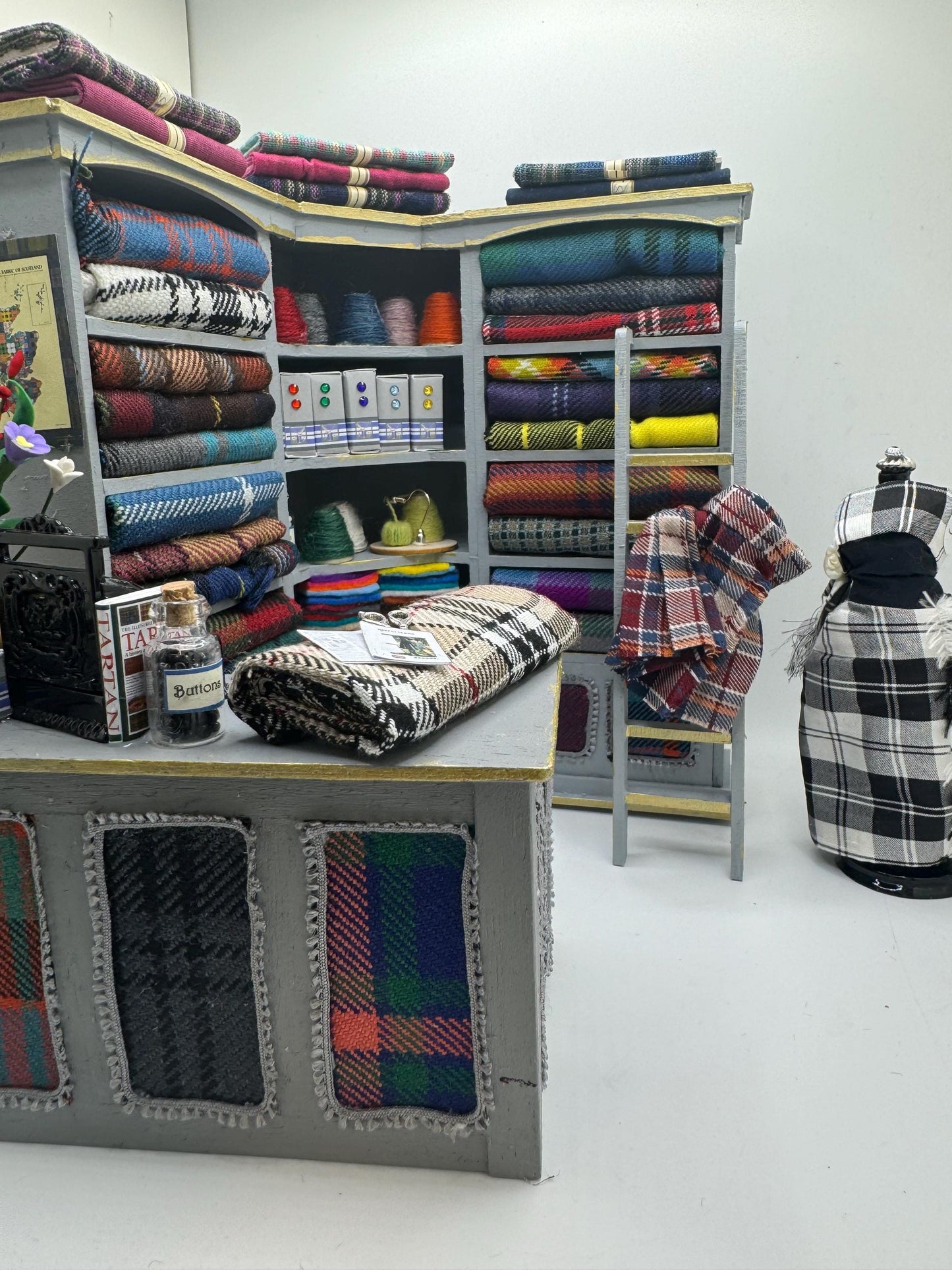 Dolls House Miniatures - 1/12th  Tartan fabric Inspired Haberdashery Shop Shelves and counter and mannequin