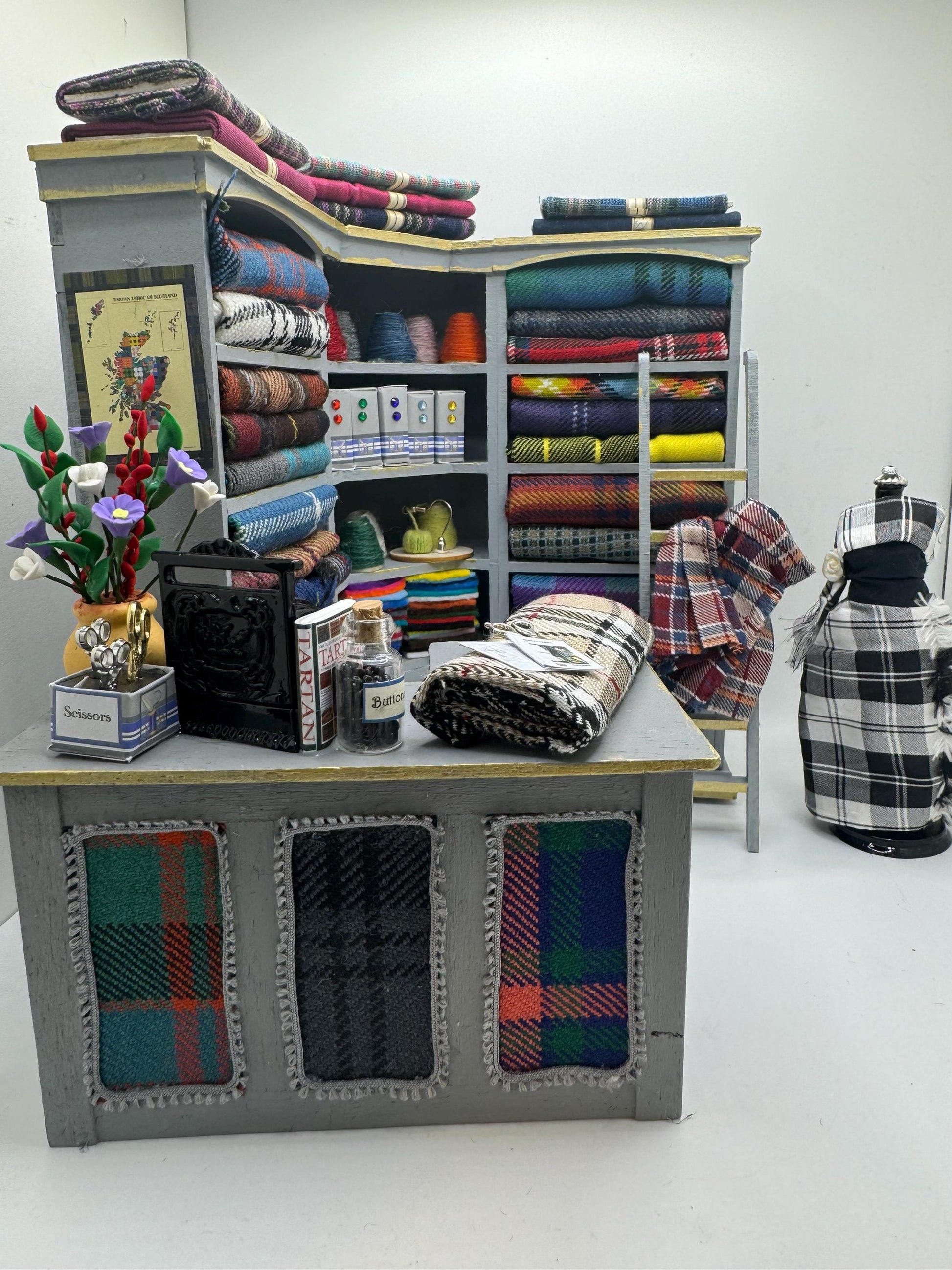 Dolls House Miniatures - 1/12th  Tartan fabric Inspired Haberdashery Shop Shelves and counter and mannequin